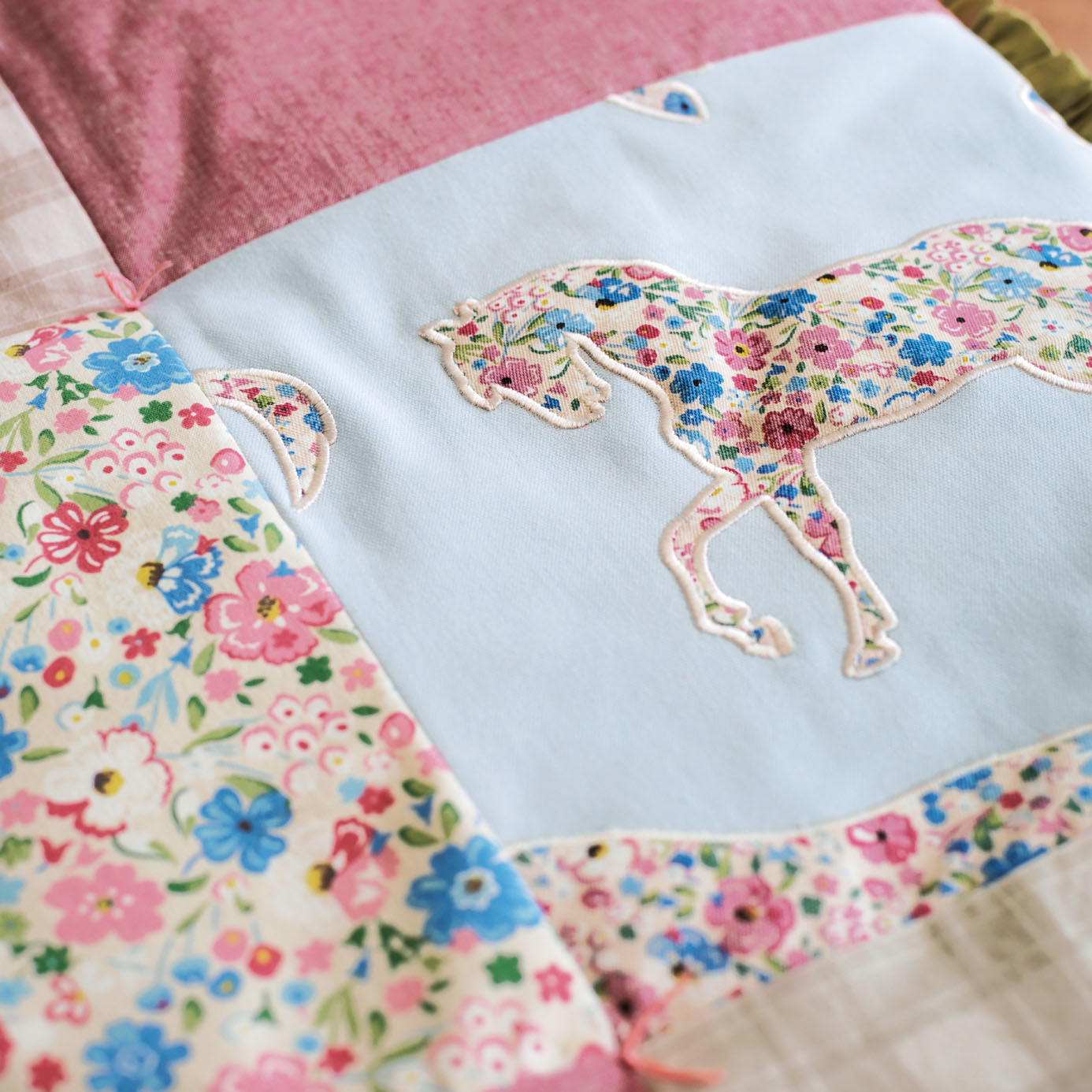 Pretty Ponies Pink/Sky Fabric by SAN